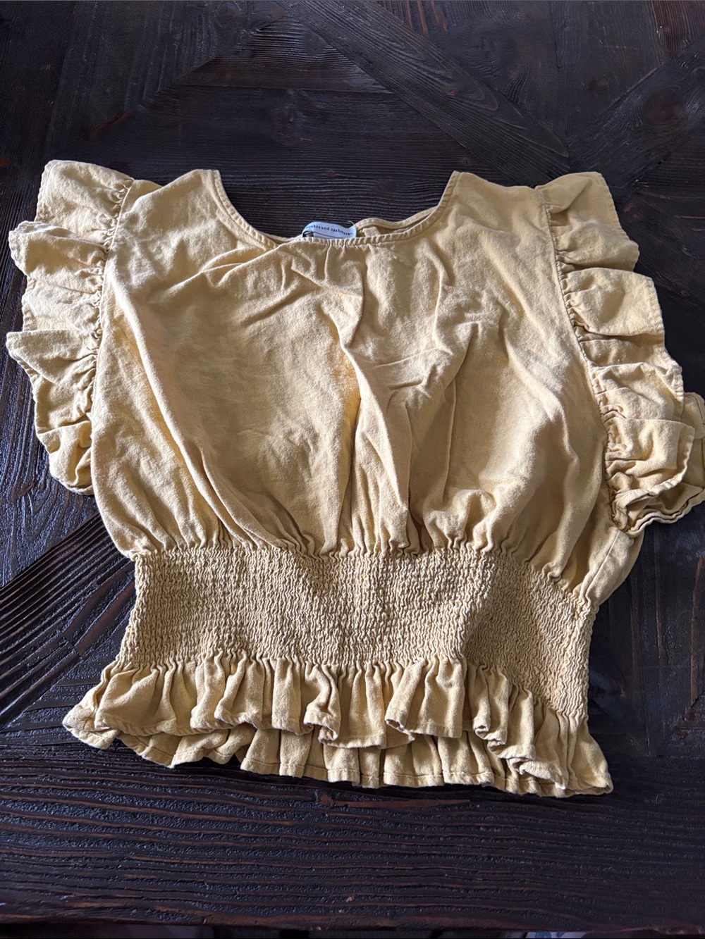 cupcakes & cashmere Mustard Ruffled Smocked Crop Top